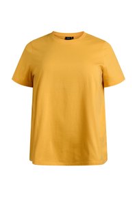 T-shirt en coton jaune à col rond, à manches courtes et à coupe décontractée. Texture lisse sans motifs ni accents visibles.
