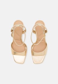 ALDO SAKE - Varrelliset sandaalit - gold