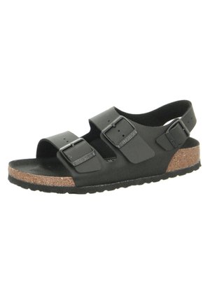 Sandalo nero con due fibbie regolabili, soletta in sughero e suola in gomma. Design aperto con una texture liscia e tacco piatto.