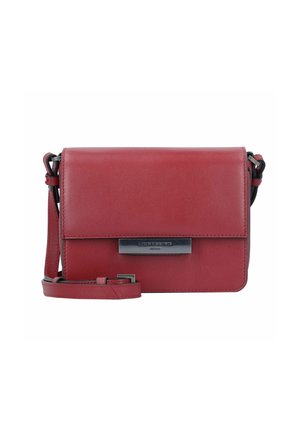 Red leather crossbody bag with a flap closure, silver hardware, and an adjustable strap. Smooth texture with a minimalist design.