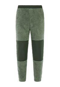 Fleece joggingbroek in olijfgroen met een getextureerde, pluizige afwerking. Beschikt over gladde, bijpassende accenten op de benen en een elastische tailleband.