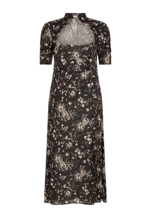 Schwarzes Blumenkleid mit kurzen Ärmeln, hohem Kragen und transparentem Brustbereich; mit cremefarbenen Blumenmustern und einem fließenden Rock.