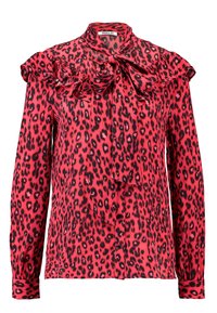 Red silk blouse with black leopard print. Features ruffled detailing and a tied collar. Long sleeves and button closure. Smooth texture.