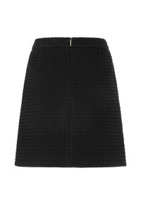 Black textured skirt with a fitted waist, featuring a zipper closure at the back and subtle stitched detailing for added dimension.