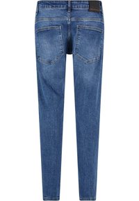 Jean skinny en denim bleu avec un lavage moyen, comportant deux poches arrière et un design de couture. La taille est accentuée par une étiquette noire.