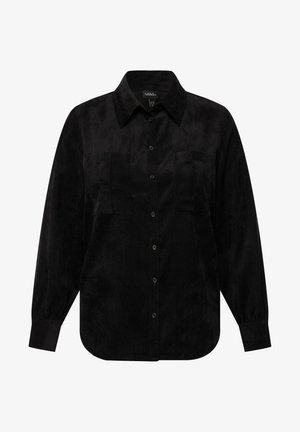 Schwarzes Cordhemd mit Knöpfen, Kragen, langen Ärmeln, zwei Brusttaschen und schwarzen Knöpfen. Glatte Textur. Abgerundeter Saum.