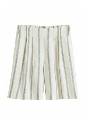 Krémovobiele kraťasy s vertikálnymi čiernymi pruhmi, prednými sklady, bočnými vreckami a elastickým pásom.