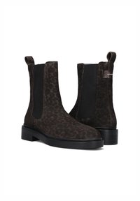 Dark brown suede Chelsea boots with subtle leopard print, black elastic side panels, pull tabs, and low black rubber heels.