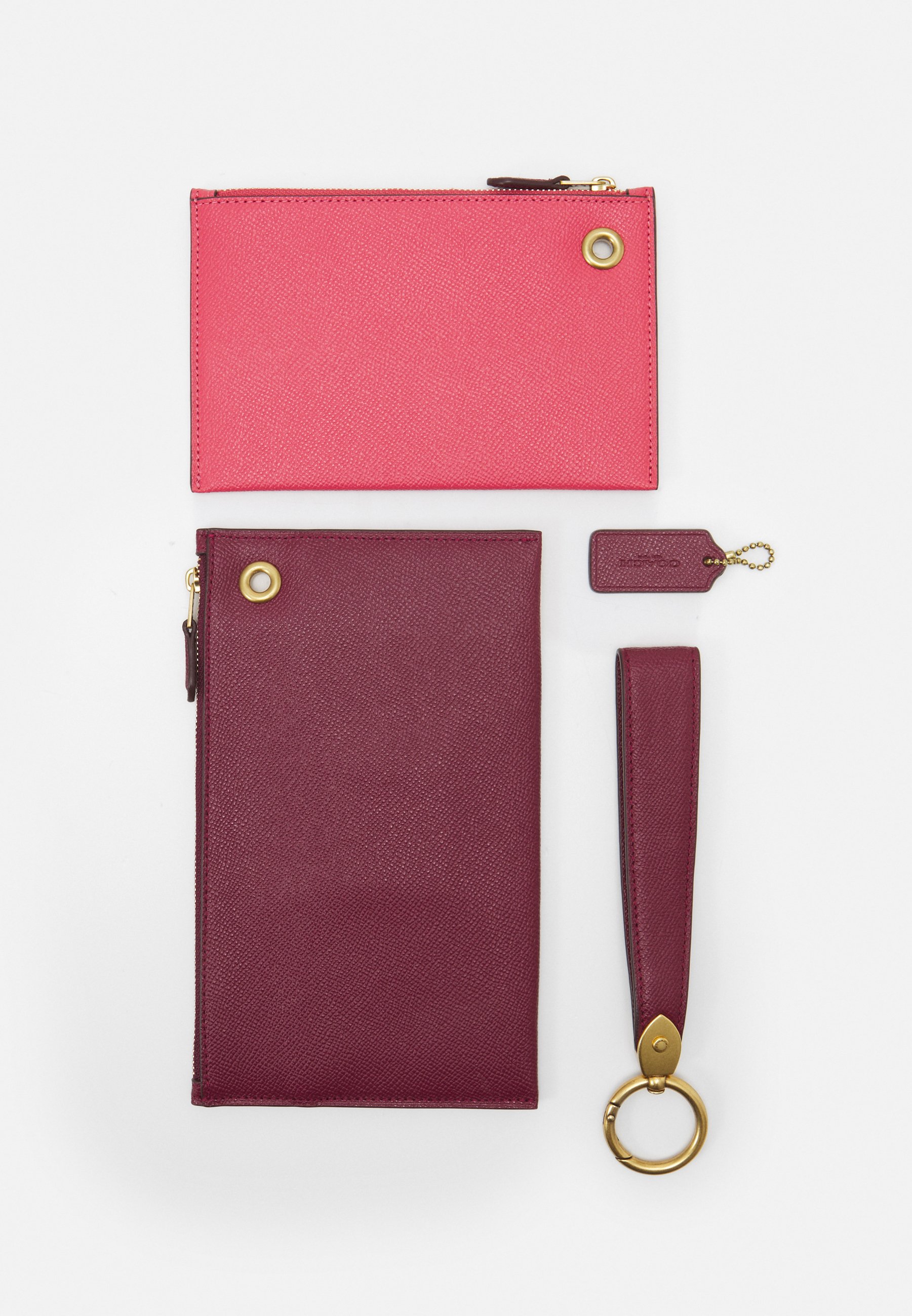 pink coach clutch
