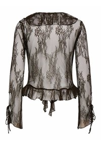 Blouse en dentelle noire transparente avec motif floral, manches longues, ourlet volanté et détails de liens aux poignets et au dos.