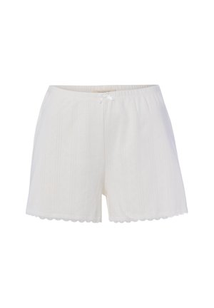 Witte gebreide shorts met verticale ribbels, een klein voorstrikje bij de elastische tailleband en geschulpte randen bij de pijpopeningen.