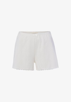Weiße Strickshorts mit vertikaler Rippenstruktur, einer kleinen vorderen Schleife am elastischen Bund und wellenförmigen Rändern an den Beinöffnungen.