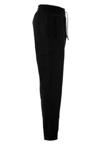 Kempa STATUS PANTS - Trainingsbroek - black