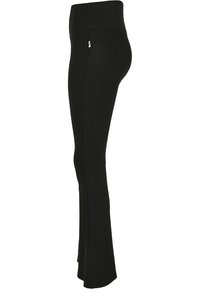 Pantalon de maternité noir, taille haute et extensible, jambes évasées, montré de profil sur fond blanc.