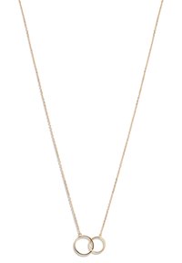 Collier doré avec une chaîne délicate et deux pendentifs ronds entrelacés. Design minimaliste avec des surfaces lisses et réfléchissantes.