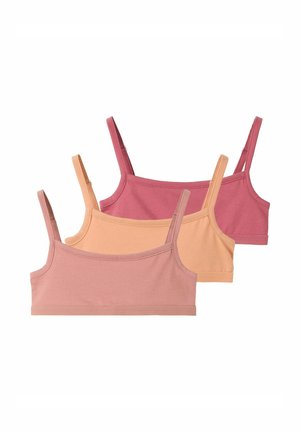 Tres tops de bralette de algodón sin costuras en tonos rosa apagado, melocotón y rosa, con tirantes finos y ajustables, dispuestos superpuestos.