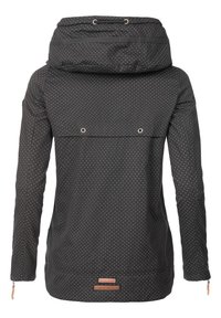 Zwarte waterdichte jas met witte polka dots. Voorzien van een hoge kraag, voorzakken en tan leren accenten bij de zoom en het merklogo.