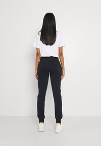 Superdry & Co Träningsbyxor - dark blue