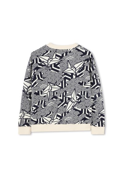 Sweatshirt marine avec un motif de bateau en origami blanc sur un design de vagues, avec un col et des poignets côtelés crème. Ourlet ajustable.