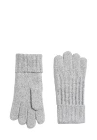 Hallid kootud kindad soonikkoes varrukatega; ühel kindal on pöial ja sõrmed, teisel on sõrmedeta disain osavuse tagamiseks.