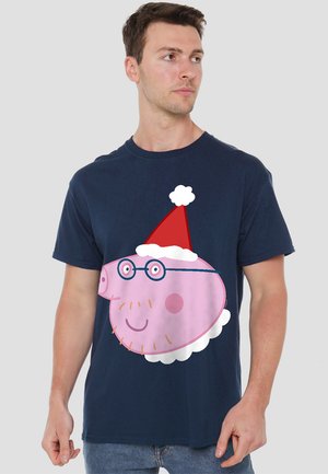 Navy blue cotton T-shirt featuring a graphic of a pink cartoon pig with glasses and a red Santa hat, outlined in white.