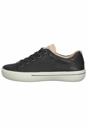 Black leather sneaker with rounded toe, white rubber sole, lace-up front, and contrasting light-colored heel accent. Textured finish.