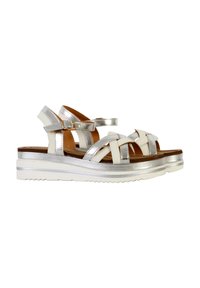 Metallic silver sandals with a multi-strapped design, white accents, cushioned insole, and a thick white platform sole.