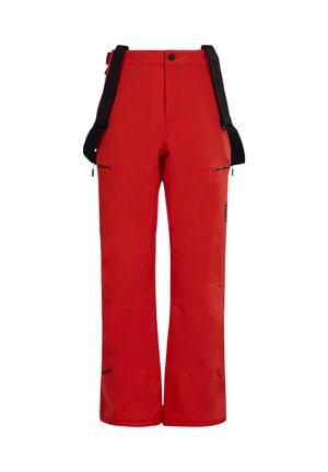 Pantalon de ski rouge en tissu résistant, avec bretelles ajustables, poches zippées et coupe droite.