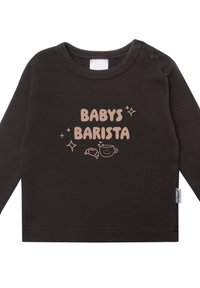 Schwarzes Langarmshirt für Kleinkinder aus Baumwolle, mit dem Schriftzug "BABY'S BARISTA" in Hellbraun, versehen mit Grafiken einer Kaffeetasse und einem Croissant.