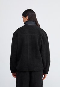 Ellesse VITERBO - Giacca invernale - black