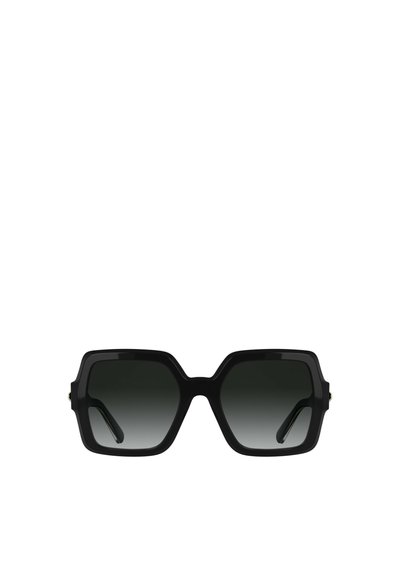 Schwarze hexagonale Sonnenbrille mit dunkel verlaufenden Gläsern. Dickes, glänzendes Kunststoffgestell mit dezenten goldenen Akzenten an den Schläfen.