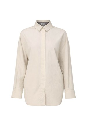 Camicia beige a maniche lunghe con bottoni, colletto appuntito e bottoni frontali nascosti, mostrata su uno sfondo bianco uniforme.