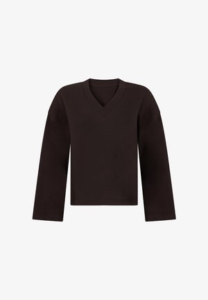 Zwart V-hals shirt met lange mouwen, een ontspannen pasvorm en een rechte zoom, afgebeeld tegen een eenvoudige witte achtergrond.