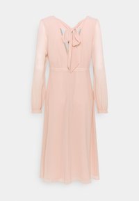 Rosa, langärmliges Kleid aus leichtem Stoff. Mit einer Schleife am Nacken und einem Ausschnitt. Elastische Ärmelbündchen. A-Linien-Silhouette.