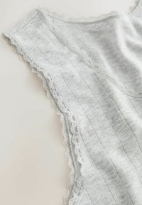 Light gray textured fabric top with lace trim on the neckline, featuring a striped pattern and small decorative dots throughout.