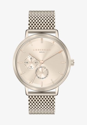 Rond horloge met een gouden mesh band, een lichtgouden wijzerplaat en twee sub-dials voor 24-uurs en datumaanduiding. Het horloge heeft gepolijste accenten en een gestructureerde bezel.