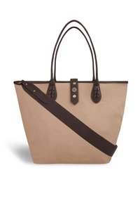 Sac en toile beige avec poignées en cuir marron foncé, garniture et bandoulière réglable, featuring un onglet en cuir à l'avant avec des accents de boutons métalliques.