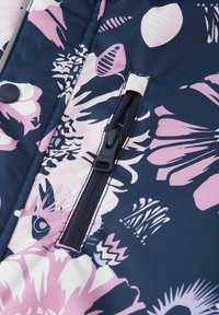 Floral-patterned navy jacket with a pink design, featuring a zippered pocket and snap button closure; smooth, durable fabric texture.