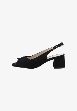 Sandalo slingback in camoscio nero con punta aperta, tacco basso a blocco e cinturino regolabile con fibbia argentata, vista laterale su sfondo bianco.
