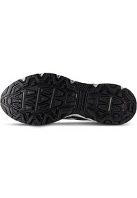 Svart gummisul av en löparsko med zickzackmönster och texturerat grepp för dragkraft och stabilitet.