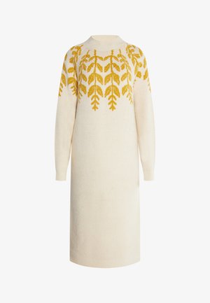 Cream-colored knitted dress featuring a yellow leaf pattern across the chest, long sleeves, and a high neckline. Smooth texture throughout.