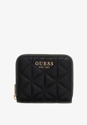 Zwarte gewatteerde leren portemonnee met gouden "GUESS EST 1981" logo en een ritssluiting aan de linkerkant.