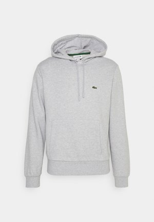 Felpa grigia chiaro con cappuccio, tasca frontale, coulisse, polsini a costine e un piccolo logo di coccodrillo verde sul petto sinistro.