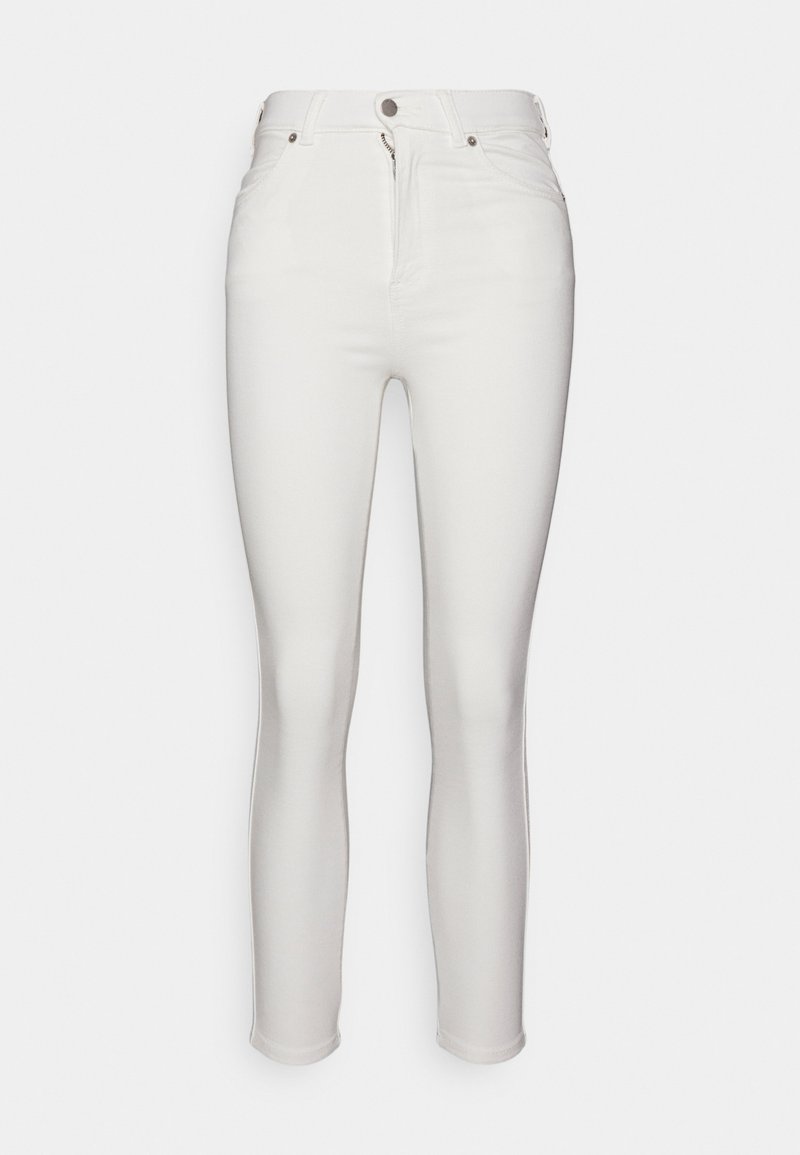 Jeans skinny de ganga branca com uma cintura alta, fecho de correr e passantes para cinto. Textura suave com detalhes em hardware mínimos.