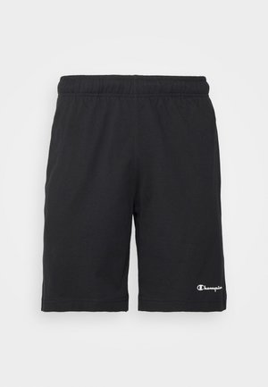 Černé sportovní šortky s elastickým pasem. Vyrobené z měkké látky, s malým bílým logem na pravé dolní straně.