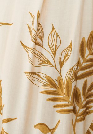 Cremefarbener Stoff mit goldenem botanischem Druck, der stilisierte Blätter und Blumen zeigt. Glatte Textur und zarte Details throughout.