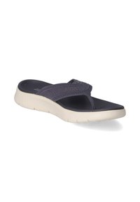 Navy blue flip-flop with a textured fabric strap, cushioned sole, and white midsole. Features a thong style design for comfort.