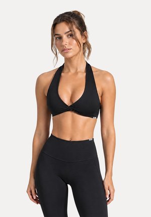 Smilodox, TWISTED V-NECK MYRAH - Sujetadores deportivos con sujeción ligera - schwarz