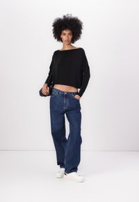 DRYKORN SOMY - Pikkade varrukatega topp - black