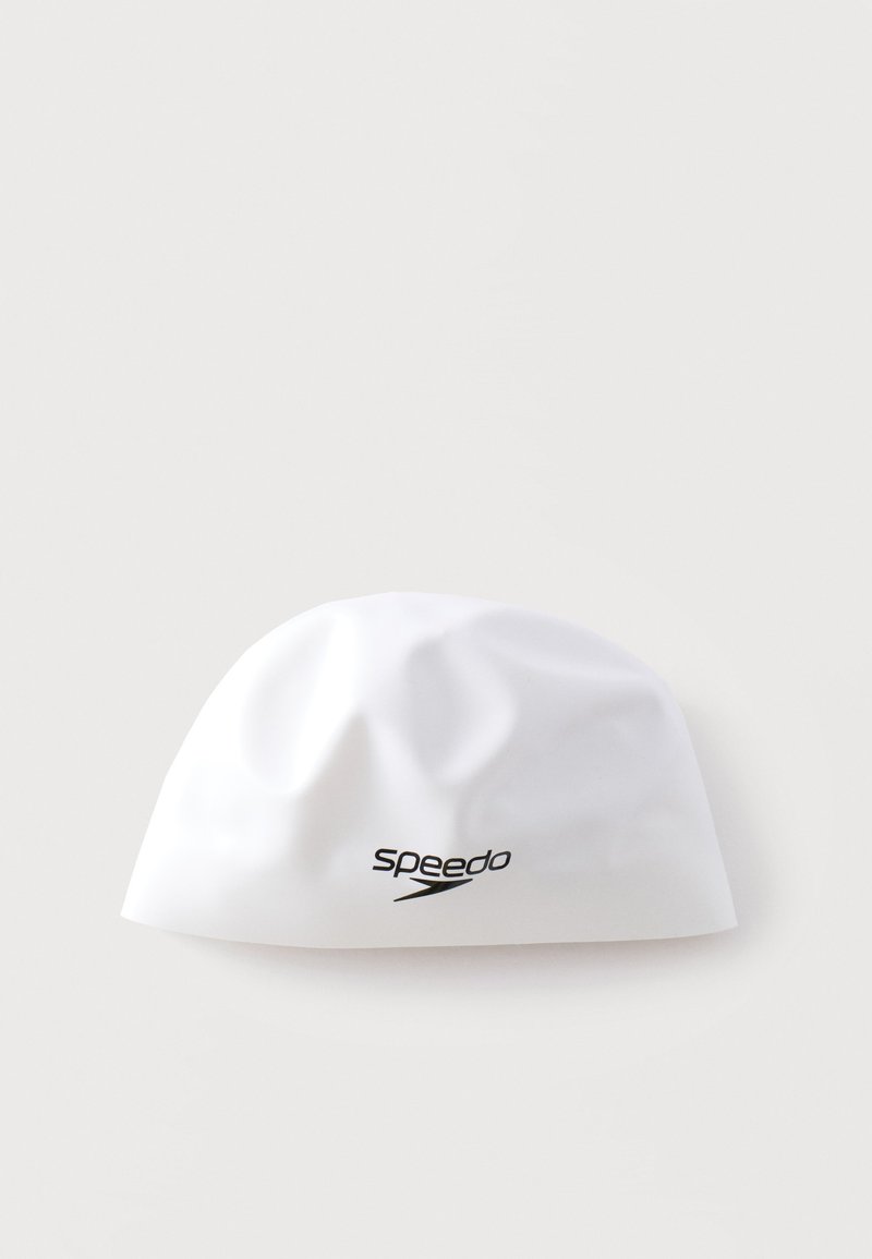 Bonnet de bain en silicone blanc avec logo Speedo noir sur un fond clair uni.